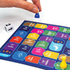 Colorful board game with game pieces and a die on a white background