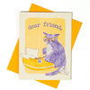 Greeting card with a purple cat wearing glasses and a yellow envelope on a white background