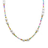 Necklace with white pearls and multicolored beads on a white background