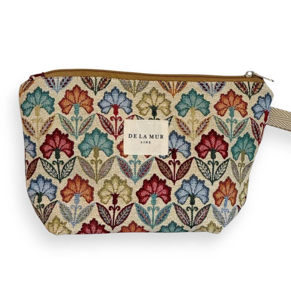 Patterned pouch with a visible brand label on a white background